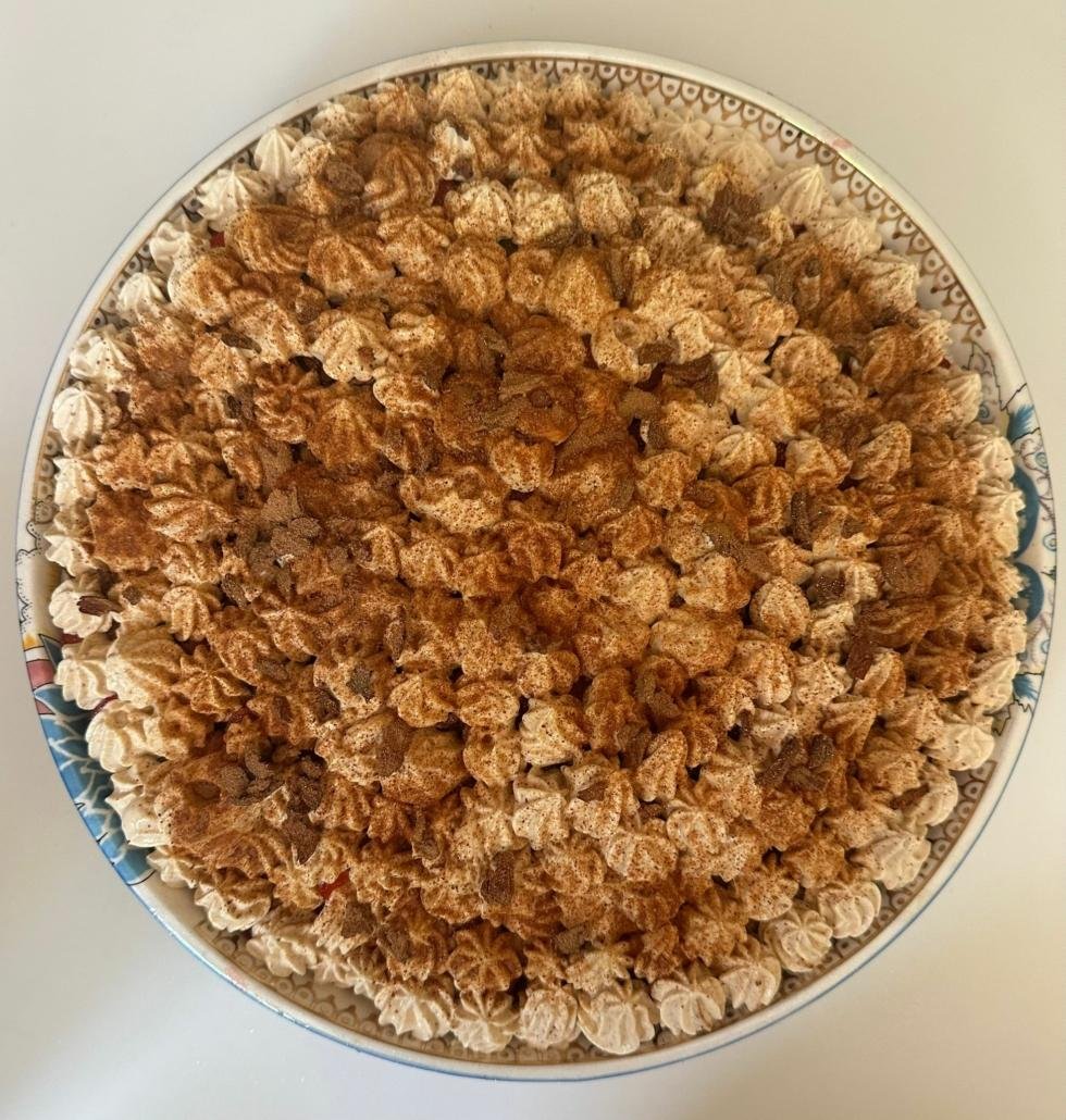 Tiramisu dusted with Madhuka powder and nibs